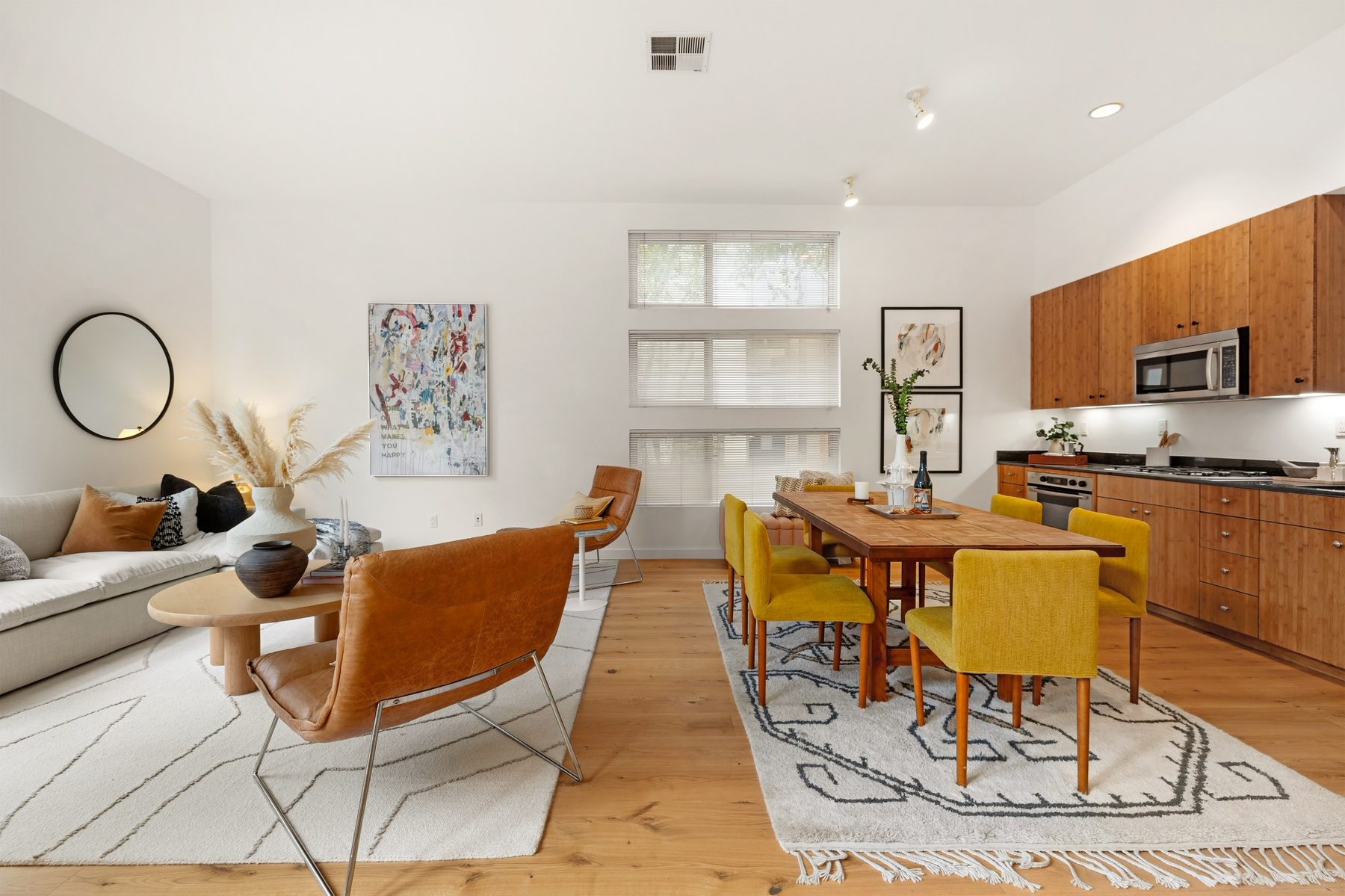Living and dining room with soaring ceilings